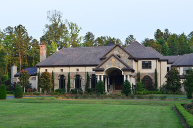 Example of a transitional two-story mixed siding exterior home design in Charlotte