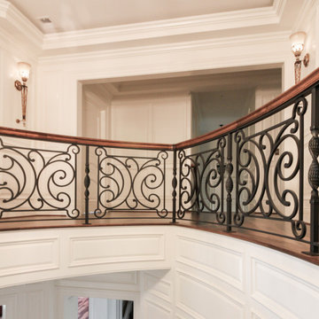 Project #74 | Circular Staircase with Hand-Forged Metal Panels