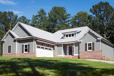 Mid-sized arts and crafts gray one-story mixed siding gable roof photo in Atlanta