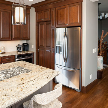 Door style: Chesapeake | Species: Cherry | Finish: Pecan with Ebony glaze