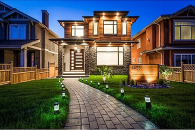 Example of a mid-sized trendy multicolored two-story mixed siding exterior home design in Vancouver