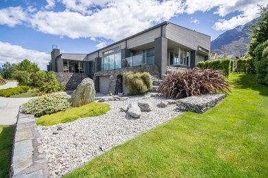 Photo of a contemporary home design in Auckland.