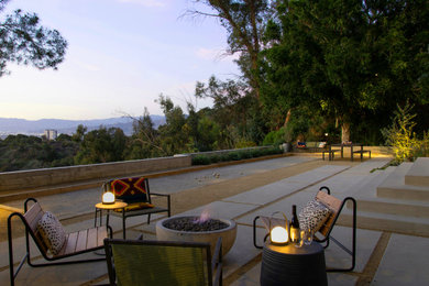 Inspiration for a large modern drought-tolerant and partial sun backyard decomposed granite landscaping in Los Angeles.