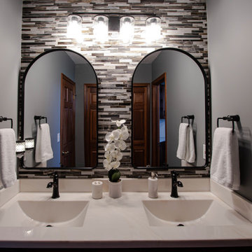 Guest Bathroom with Mosaic Tile on Above Vanity, Cultured Marble Countertop