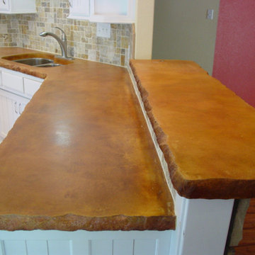 Kitchen Concrete Countertops with Acid Stain and Rock Edge
