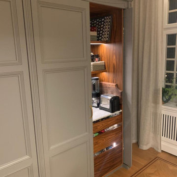 High cabinets with pocket doors