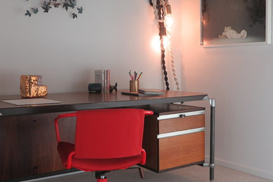 Example of a mid-sized trendy freestanding desk carpeted and gray floor study room design in San Francisco with white walls
