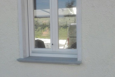 Serramenti in legno su misura in rovere lamellare Laccati Ral 1013
