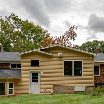 Cheerful Multi Level Rear Addition to Expand Kitchen, Mudroom & Sunroom in Oakt