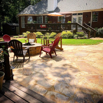 Flagstone patio and Moss rock Wall
