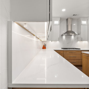 Seamless White Quartz Countertop and Backsplash Detail After Remodel