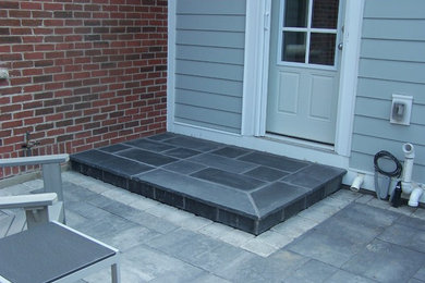 Patio - contemporary patio idea in Other