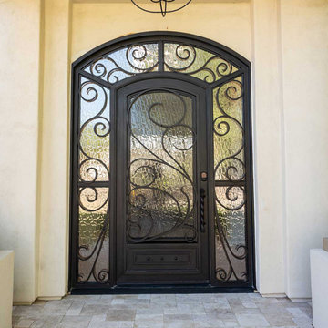 Arched Florentine Iron Entry Door