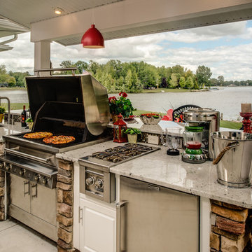 Luxurious White Outdoor Kitchen - Accented by Stone