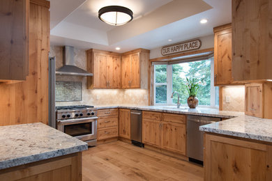 Mountain style kitchen photo in Other with shaker cabinets and granite countertops
