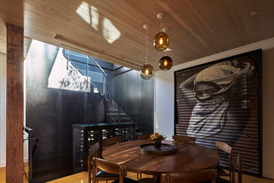 Example of a minimalist dining room design in New York