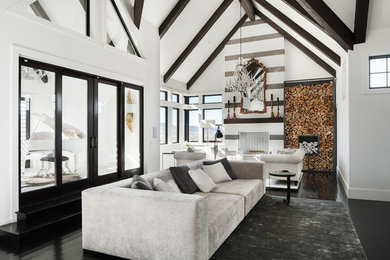 Inspiration for a contemporary formal and open concept dark wood floor living room remodel in Salt Lake City with a standard fireplace, a brick fireplace and white walls