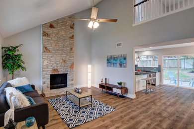 Example of a transitional living room design in Austin