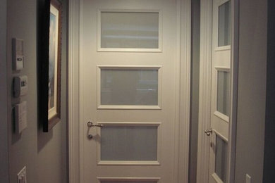 Hallway - small traditional hallway idea in Chicago with gray walls