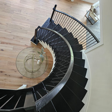 Project #130 | Curved Staircase with Wraparound Balcony