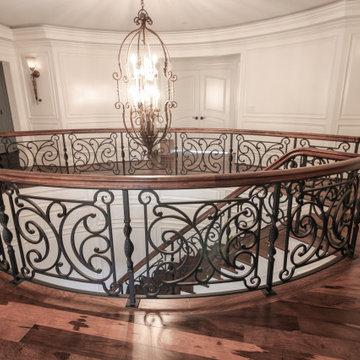 Project #74 | Circular Staircase with Hand-Forged Metal Panels