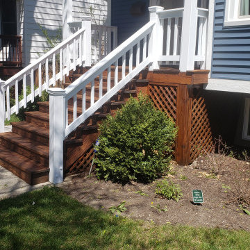 Evanston front porch power wash, staining and painting.