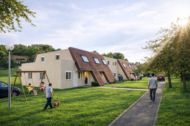 Réalisation d'un façade d'immeuble minimaliste en béton de taille moyenne avec un toit plat, un toit mixte et un toit noir.