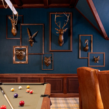 Framed Faux Taxidermy Gallery Wall in a Moody Walnut Game Room