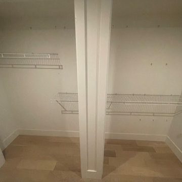 Custom shelving and hidden door