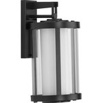 Progress Lighting - Irondale Collection Black 1-Light Medium Wall Lantern - Incorporate memorable modern lighting with the industrial Irondale Collection’s One-Light Black Wall Lantern. A matte black frame attaches to a rectangular wall plate. A clear glass shade holds an etched glass diffuser ready to provide a lovely ambient glow.