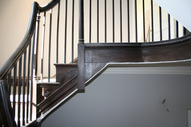 Inspiration for a large traditional wood l-shaped staircase in Gloucestershire with wood risers.