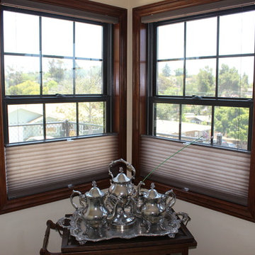 Elegant dining room with top down bottom up honeycomb shades