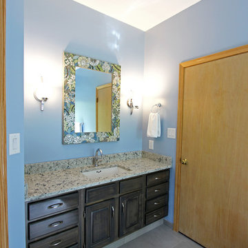 Master Bathroom with Free Standing Tub, Quartz Countertop and Grey Tiled Shower