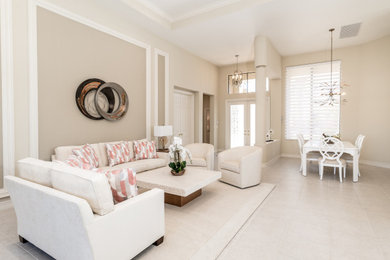 Example of a large transitional living room design in Other