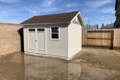 Example of a minimalist beige exterior home design in Sacramento