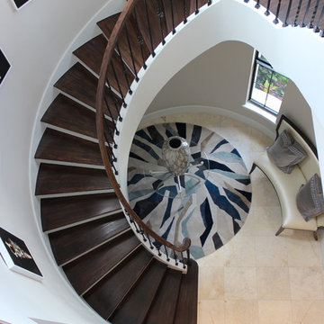 Curved Red Oak Stair with Single Basket & Twist Iron Balusters
