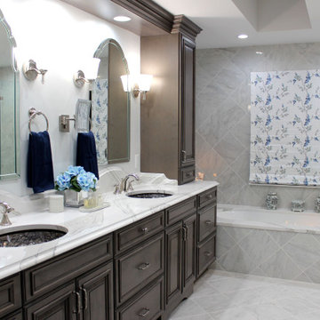 Luxurious Spa Master Bath With Grain Stain Custom Cabinetry & Built-In Bathtub
