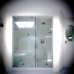 Q4 Hinged Frameless Glass Shower Installations - Steam Showers