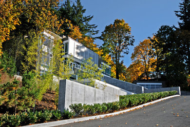 Large contemporary three-story exterior home idea in Portland