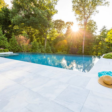 Luxury vanishing edge swimming pool and outdoor living area Ridgewood NJ
