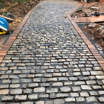 Reclaimed Cobblestone Driveway with Antique Brick Paver Border