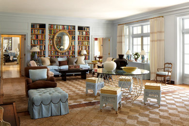 Living room - mid-sized traditional formal and enclosed medium tone wood floor and brown floor living room idea in New York with blue walls, no fireplace and no tv