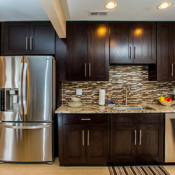 Contemporary Espresso Kitchen Remodel with Granite Counters & Mosaic Backsplash