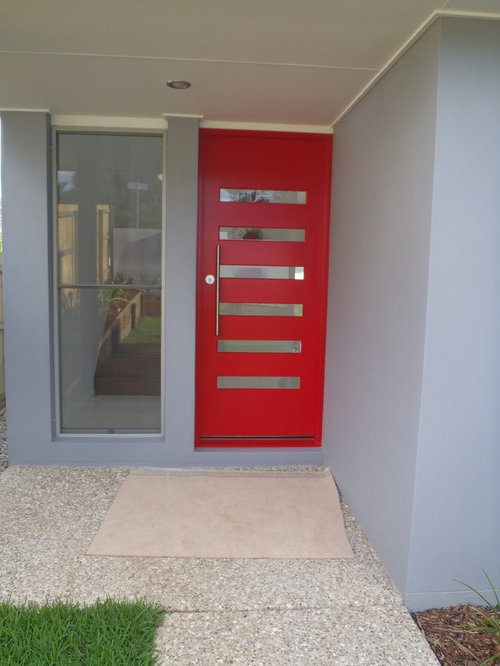 Exterior red door with white bricks????