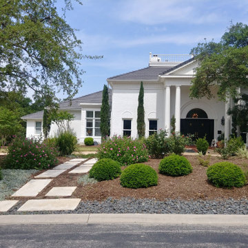 Grand Home with White Painted Brick Exterior