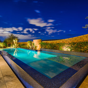 Raised Rim Flow Pool with Custom Fire/Water Feature