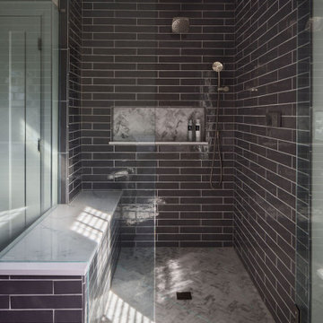 Primary En Suite w/ Blue Cabinets & Grey Tiled Walk-in Shower