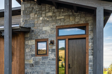 Entryway - rustic entryway idea in Other