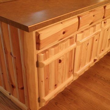 Knotty pine log kitchen cabinets