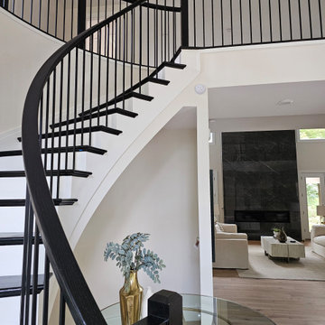 Project #130 | Curved Staircase with Wraparound Balcony